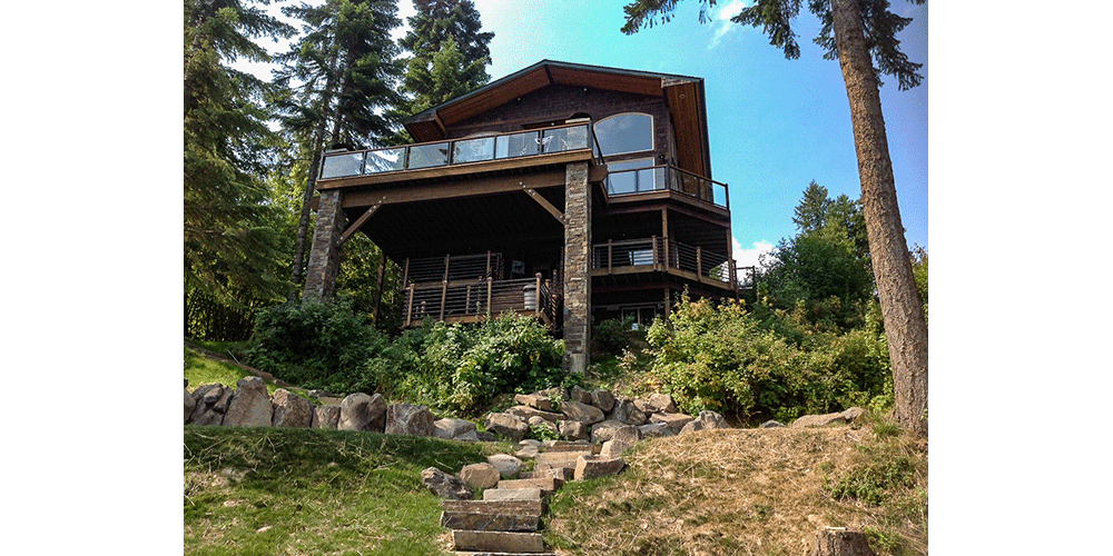 Decks can be tailored to the lay of the land. In this case, a southern view of the lake called for a large elevated deck as the main space. Not only does the main deck and glass railing give expansive views of the lake, but lower decks were well planned out and tucked underneath. These lower decks are shaded from the midday sun while not impeding the morning sunrise.
Photo courtesy of: Edwards Smith Construction